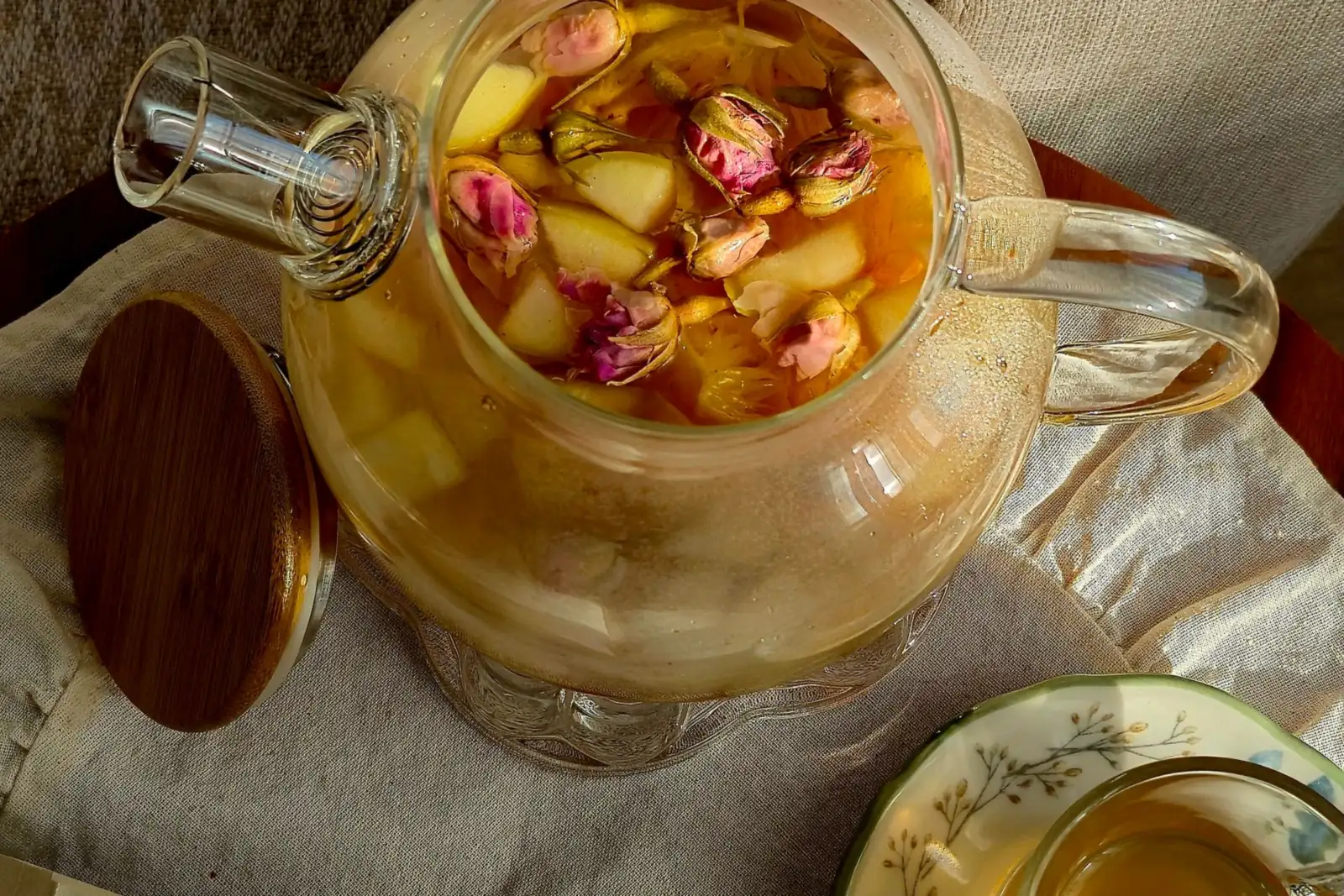 Herbal tea and an open book on a cozy table